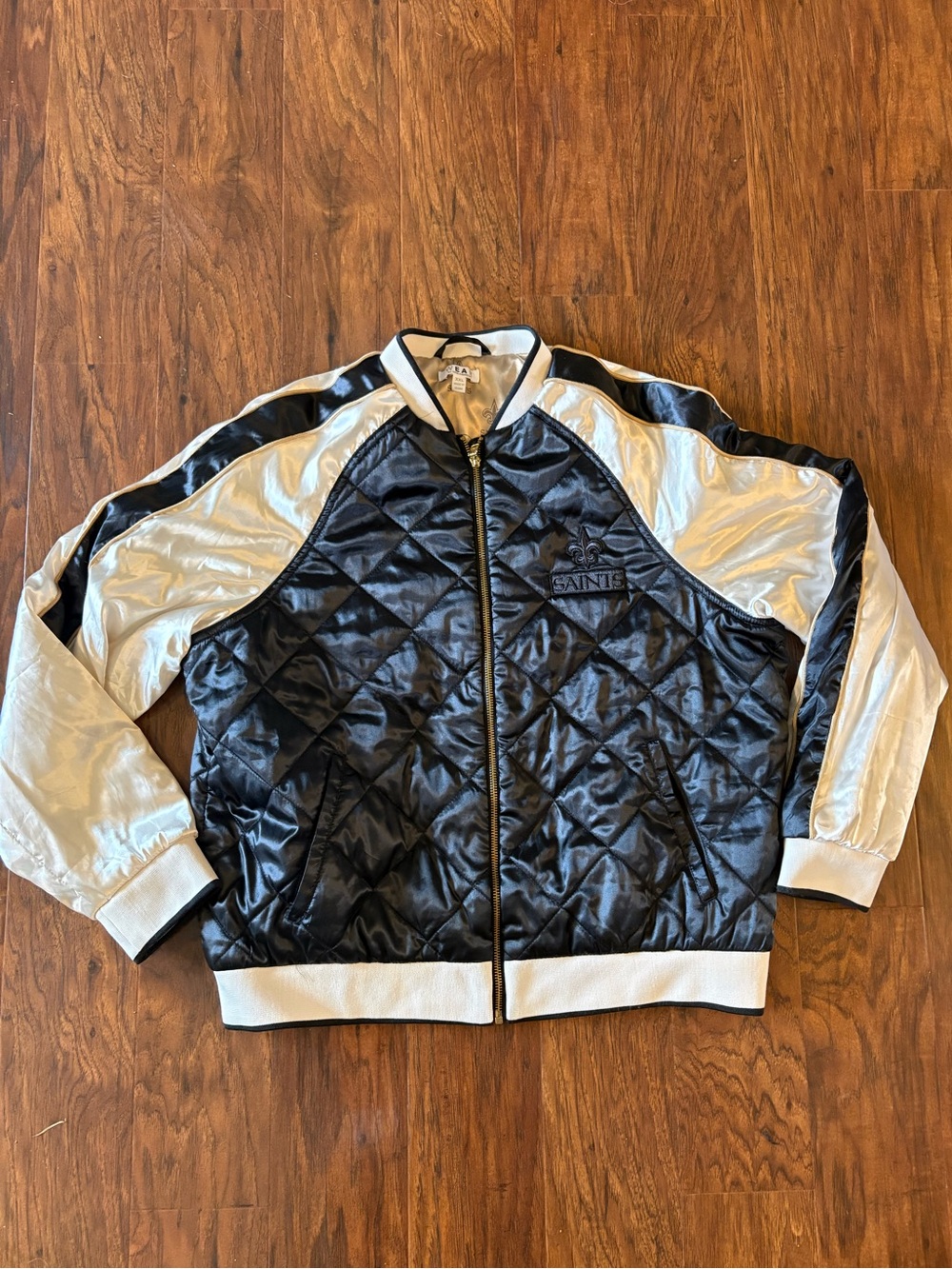 WEAR by Erin Andrew’s Quilted New Orleans Saints Satin Bomber Jacket